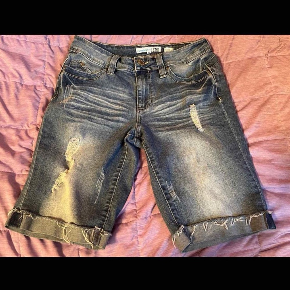 ripped blue denim shorts